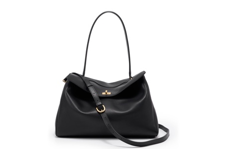 Black leather shoulder bag with a gold turn-lock flap